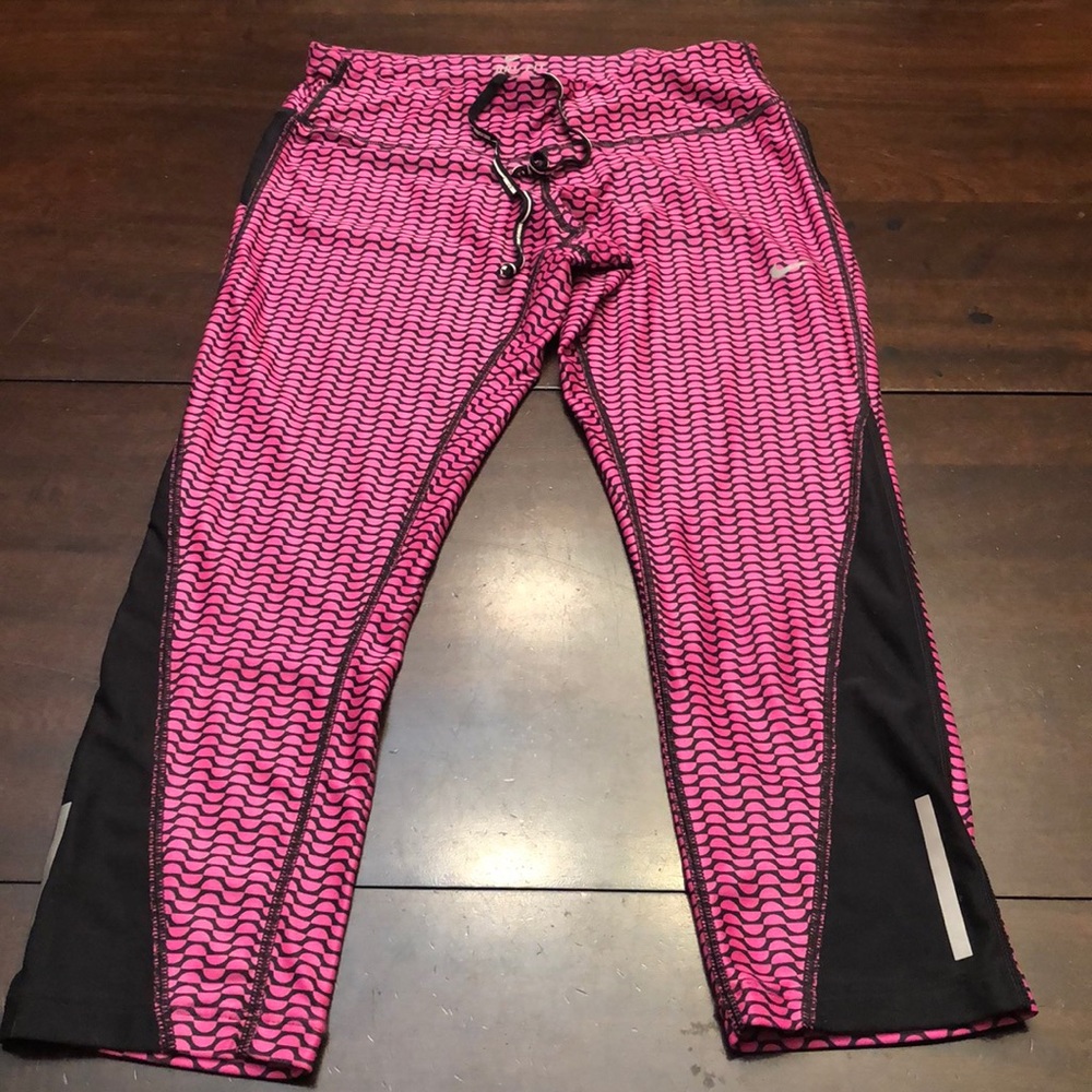 Nike Dri fit running capris. Inseam 21.